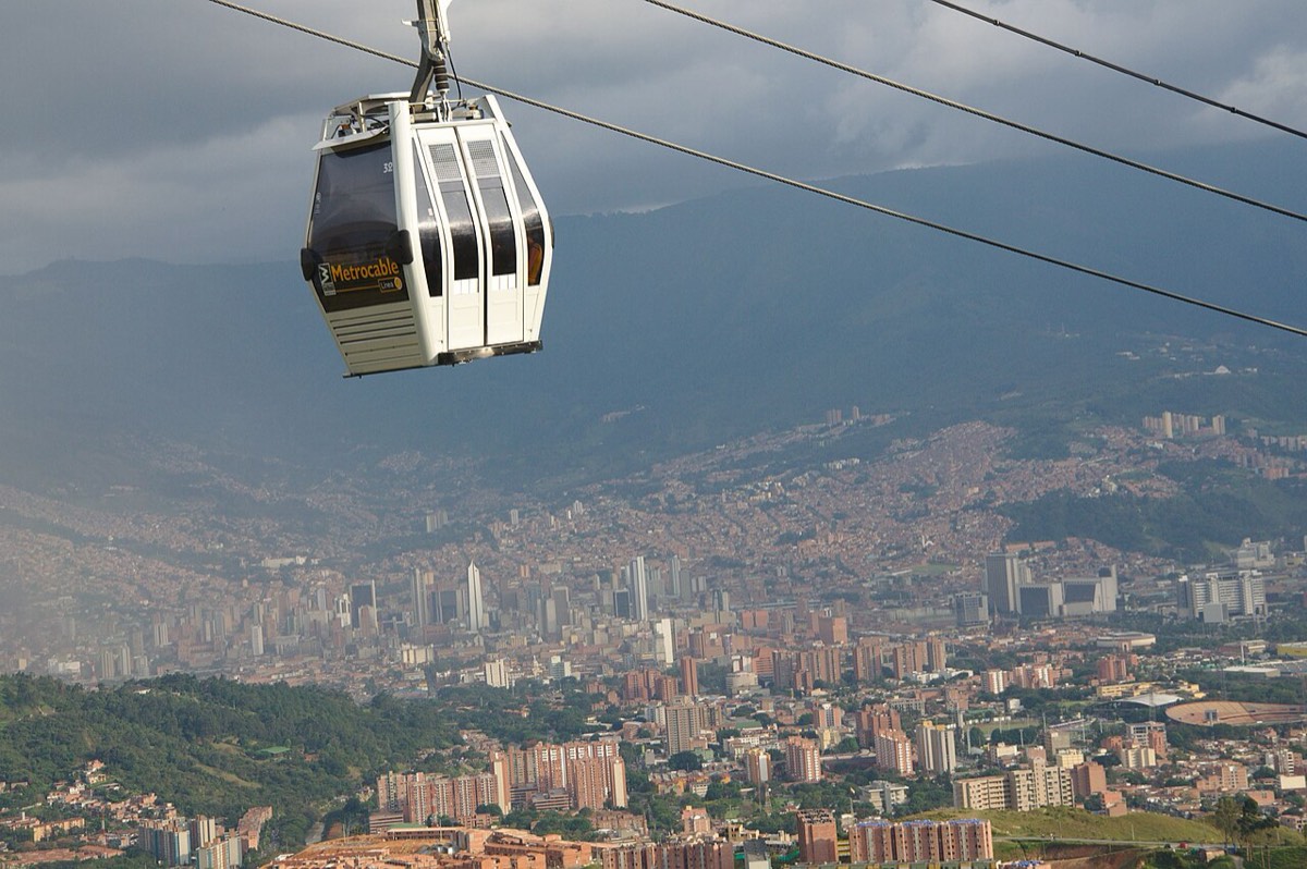 A Metrocable gondola above the city of Medellín and its valley